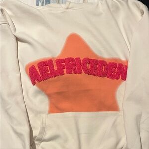 Aelfric Eden Cream Sweatshirt with Orange and Pink Star Design